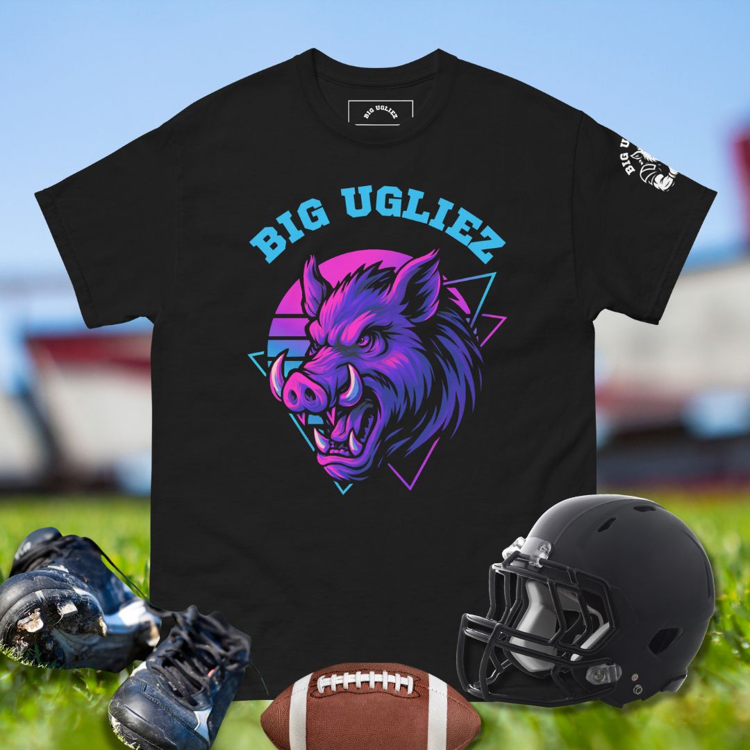 Black t-shirt with 'BIG UGLIEZ' graphic on a grassy field background