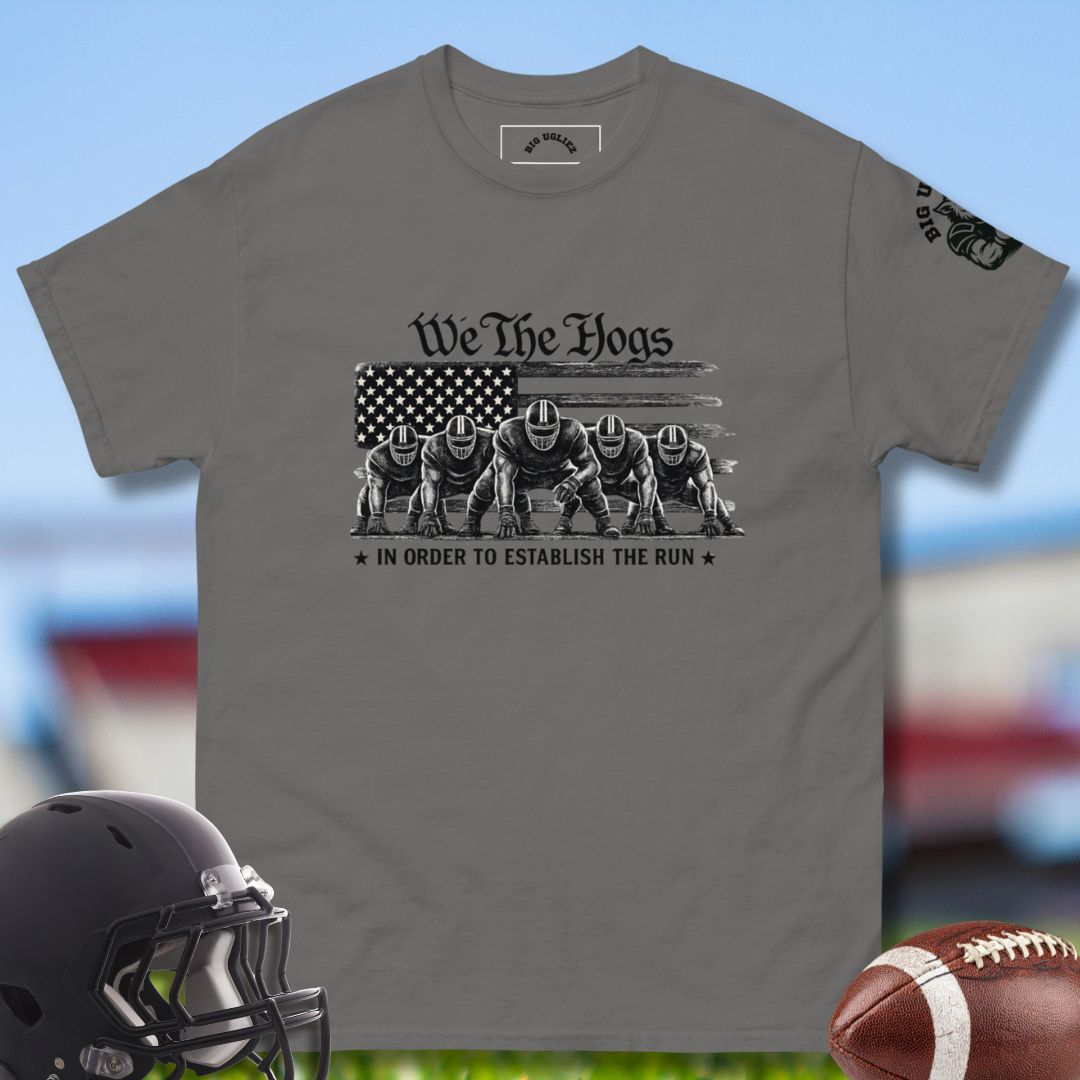 We The Hogs tshirt by Big Ugliez with offensive lineman and the US flag printed on front of green tshirt.