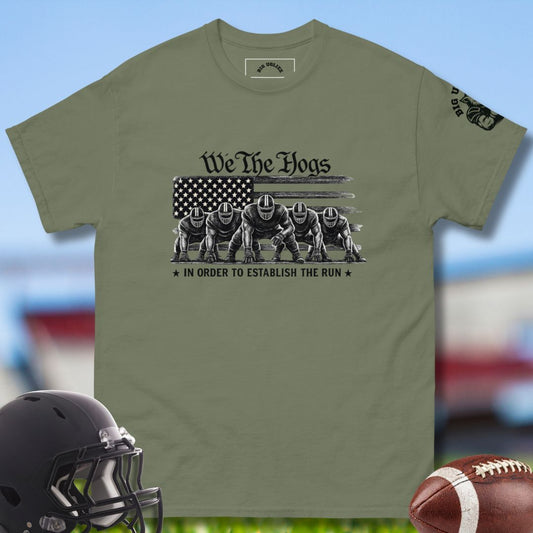 We The Hogs tshirt by Big Ugliez with offensive lineman and the US flag printed on front of military green tshirt.