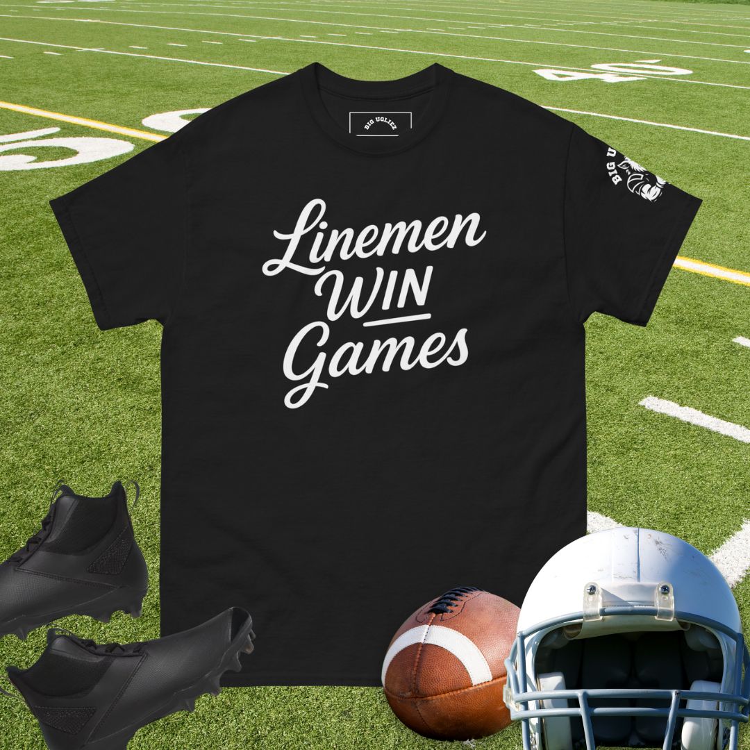 Black Tshirt with text: Linemen Win Games football in white script