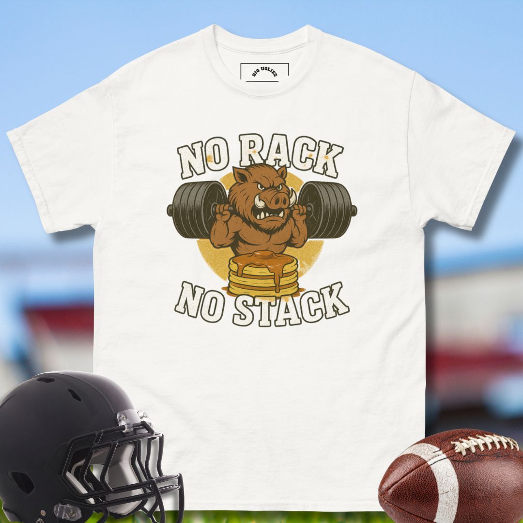 White t-shirt with a graphic of a bear lifting weights and text 'NO RACK NO STACK' on a blurred sports field background. Tee for football players