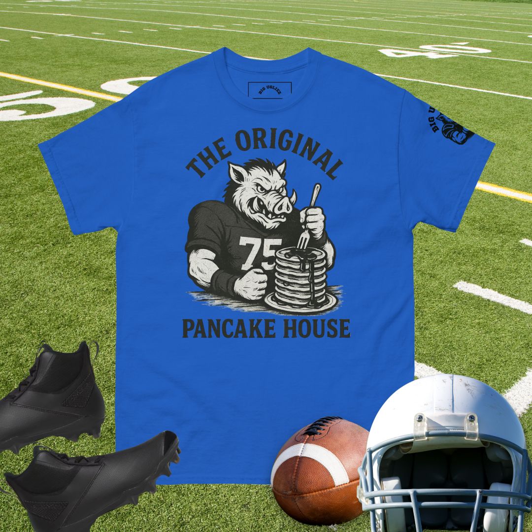 Big Ugliez hog in football jersey stacking pancakes