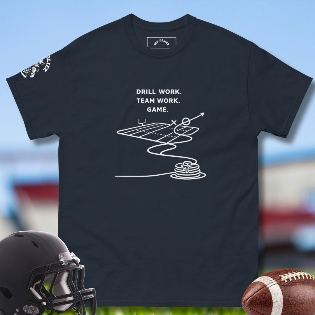 Black t-shirt with white graphic and text on a sports-themed background