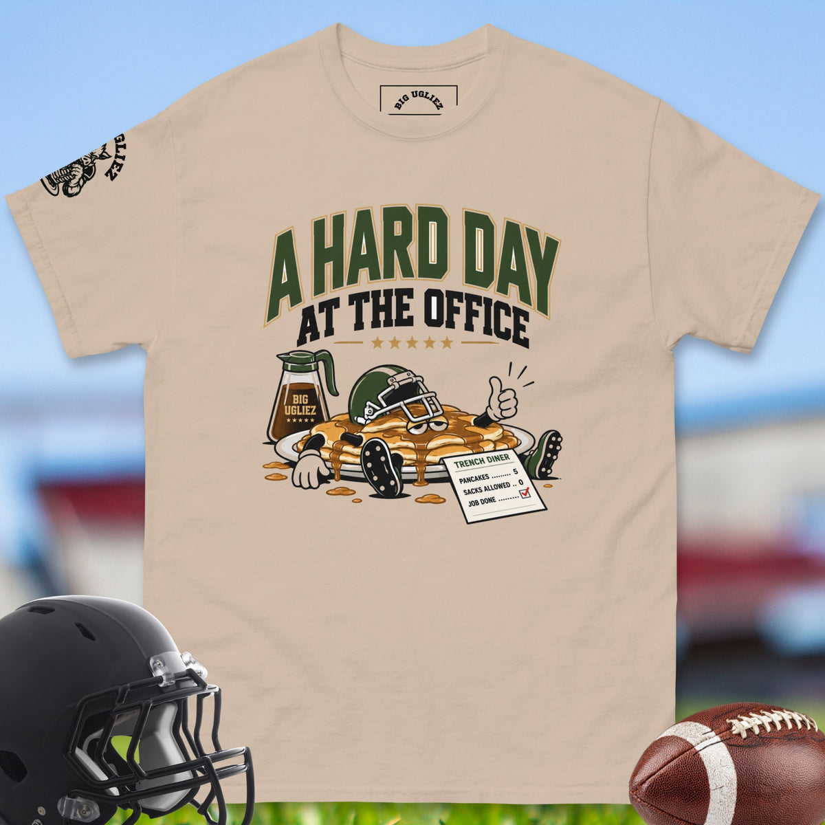 a-hard-day-at-the-office-offensive-linemen-t-shirts-by-big-ugliez-in-sand