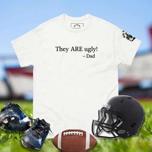 Football shirt with text They ARE ugly! – Dad in black lettering