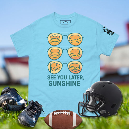 Football shirt with sunglasses reflecting pancakes and text See You Later Sunshine in Blue color