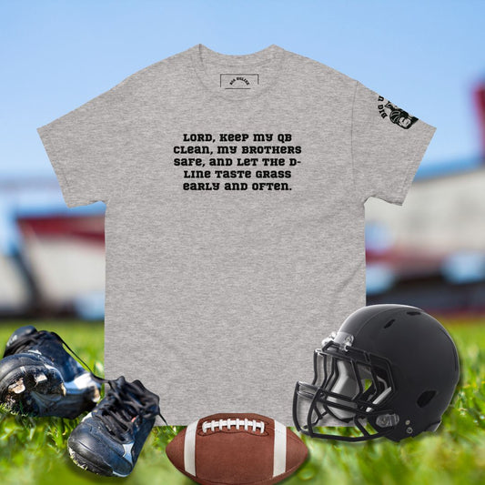 Gray football prayer shirt with the quote: Lord, keep my QB clean, my brothers safe, and let the D-line taste grass early and often.