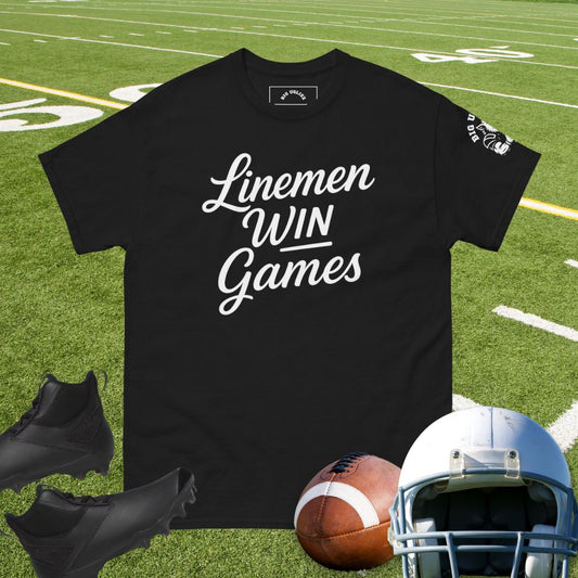 Black Tshirt with text: Linemen Win Games football in white script