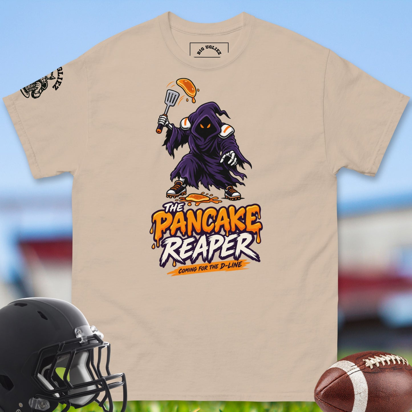 the-pancake-reaper-offensive-linemen-t-shirts-by-big-ugliez-in-sand