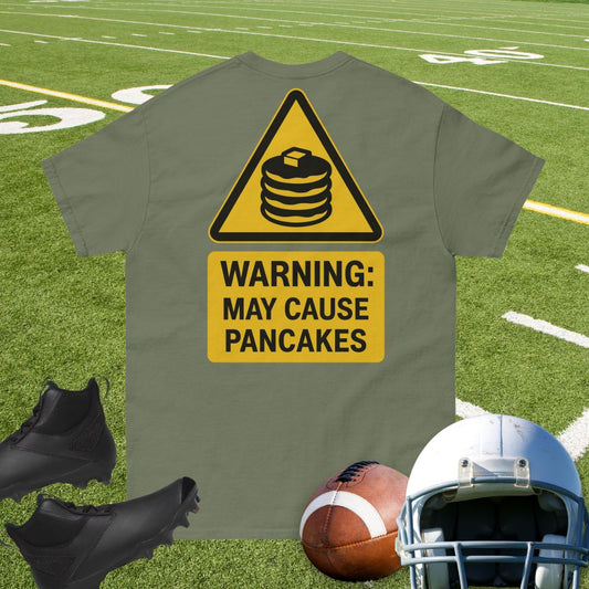 Yellow warning sign t-shirt with bold text “Warning: May Cause Pancakes” for football offensive linemen.